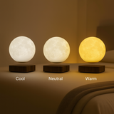 Three AerLune moon lamps showing cool, neutral and warm light
