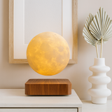 AerLune warm moon lamp on a bedroom side table