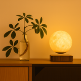 AerLune warm moon lamp lighting a sideboard