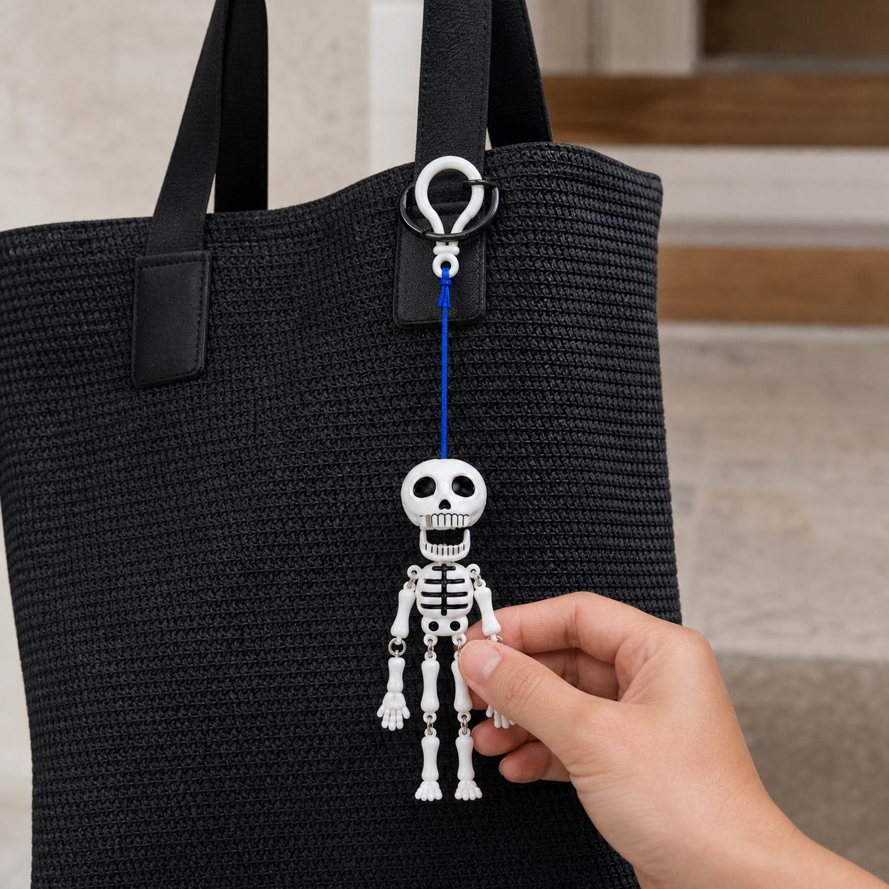 Mr. Bones pull-cord skeleton hanging from a car mirror